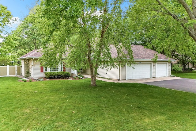 205 Forestview Ln N, Plymouth, MN 55441 - view of front facade featuring driveway, a shingled roof, and an attached garage