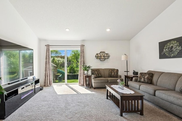carpeted living room with recessed lighting