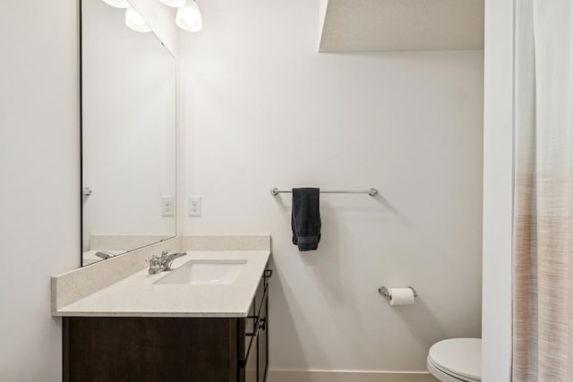 full bath with vanity and toilet