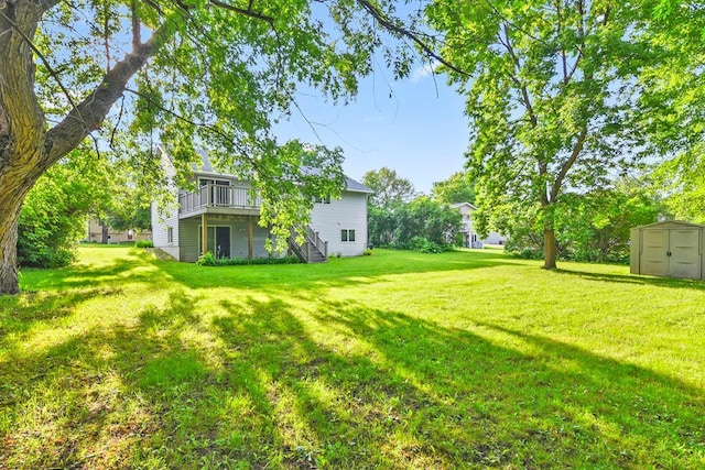 204 10th Ave N, Cold Spring, MN 56320 - view of green lawn featuring a storage shed, stairs, and a deck