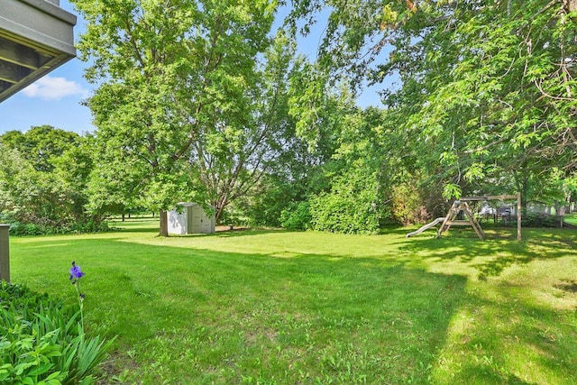 204 10th Ave N, Cold Spring, MN 56320 - view of grassy yard with a storage unit