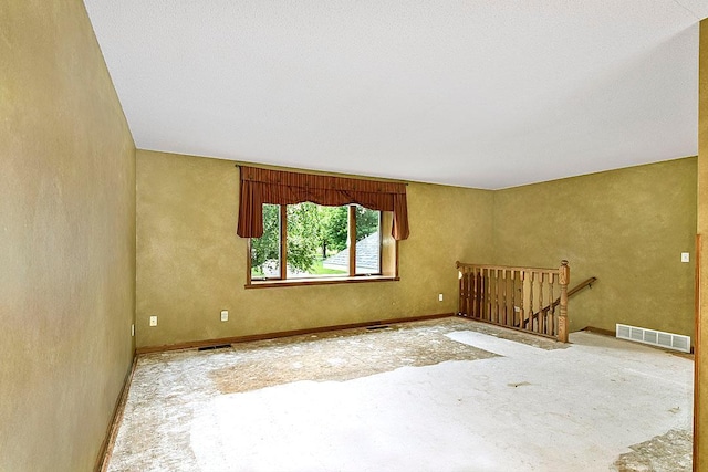 204 10th Ave N, Cold Spring, MN 56320 - empty room featuring baseboards and a textured wall