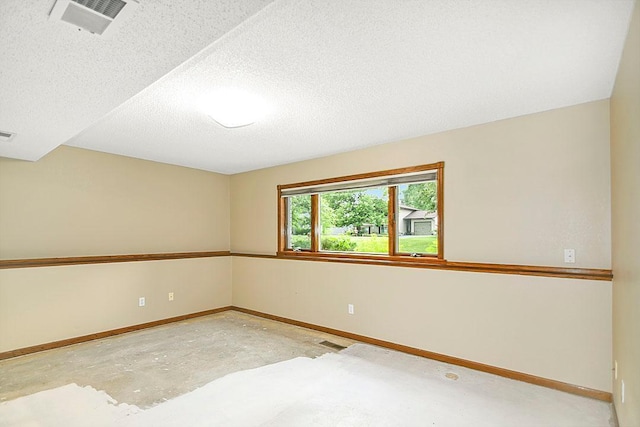 204 10th Ave N, Cold Spring, MN 56320 - spare room featuring concrete floors and a textured ceiling