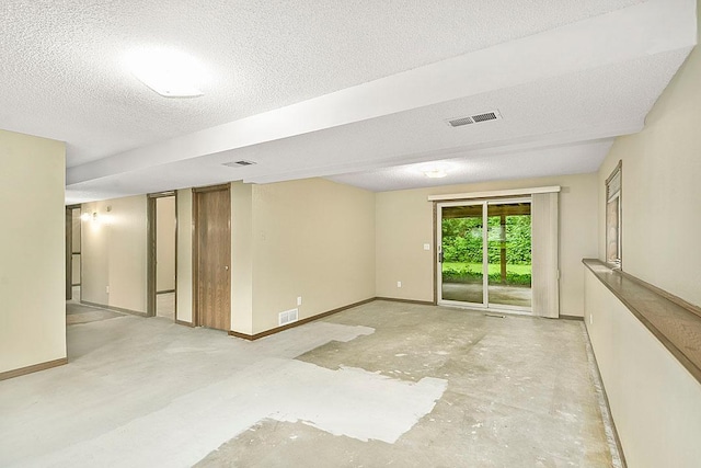 204 10th Ave N, Cold Spring, MN 56320 - unfurnished room with a textured ceiling and concrete floors