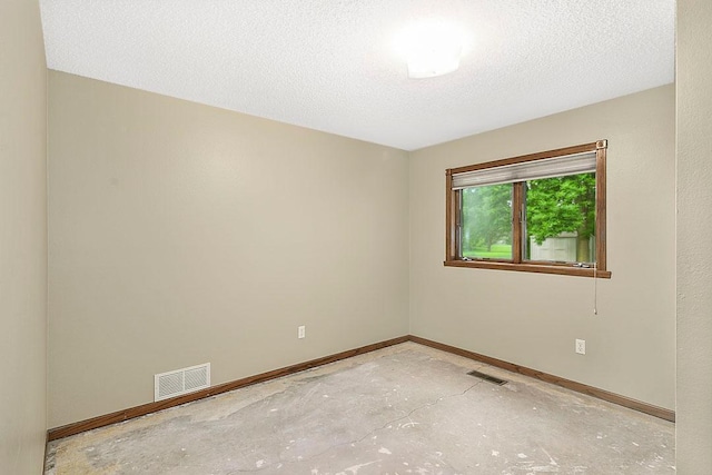 204 10th Ave N, Cold Spring, MN 56320 - unfurnished room featuring baseboards and a textured ceiling