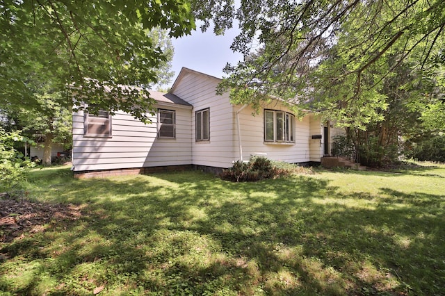 203 Main St, Crosby, MN 56441 - view of home's exterior with a lawn