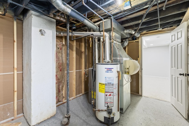 unfinished below grade area featuring water heater
