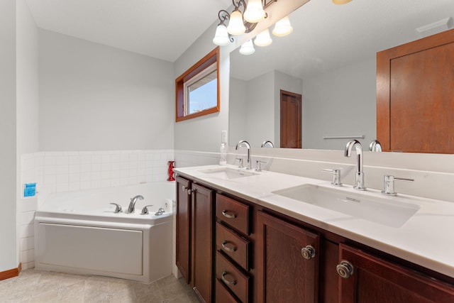 full bath featuring double vanity, visible vents, a sink, and a bath