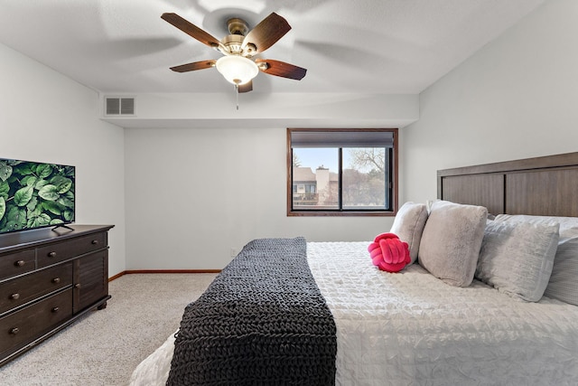 2071 Parkside Dr Unit 30, Saint Paul, MN 55119 - bedroom featuring light colored carpet, baseboards, and ceiling fan