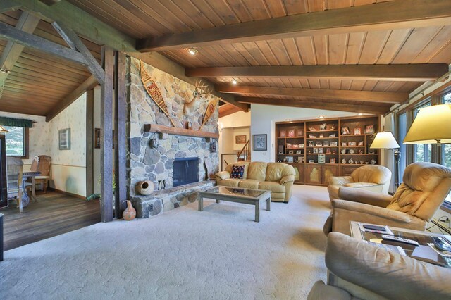 2072 Bluebill Ln SW, Nisswa, MN 56468 - carpeted living area featuring wooden ceiling, a fireplace, wood finished floors, and built in features