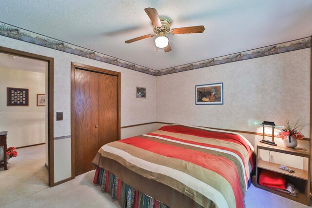 2072 Bluebill Ln SW, Nisswa, MN 56468 - bedroom with light colored carpet, a closet, and ceiling fan
