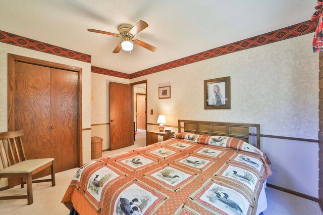 2072 Bluebill Ln SW, Nisswa, MN 56468 - bedroom featuring a closet, carpet, and a ceiling fan