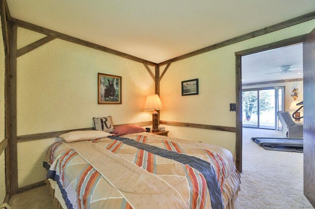 2072 Bluebill Ln SW, Nisswa, MN 56468 - bedroom featuring a textured wall, carpet floors, and baseboards