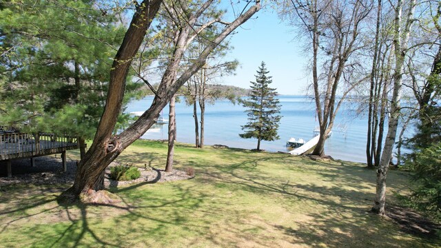 2072 Bluebill Ln SW, Nisswa, MN 56468 - view of yard featuring a deck with water view