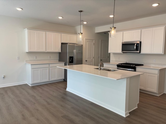 1763 Hauer Trl, Shakopee, MN 55379 - kitchen featuring appliances with stainless steel finishes, a sink, white cabinetry, dark wood-type flooring, and recessed lighting