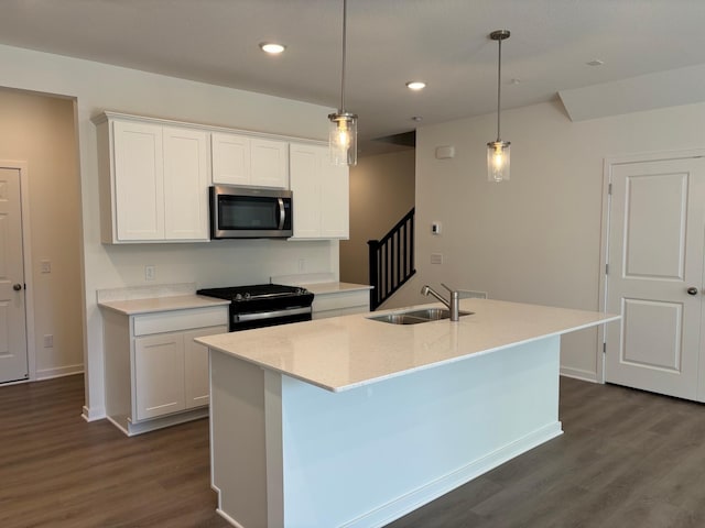1763 Hauer Trl, Shakopee, MN 55379 - kitchen with stainless steel microwave, a sink, black / electric stove, dark wood-style floors, and white cabinetry