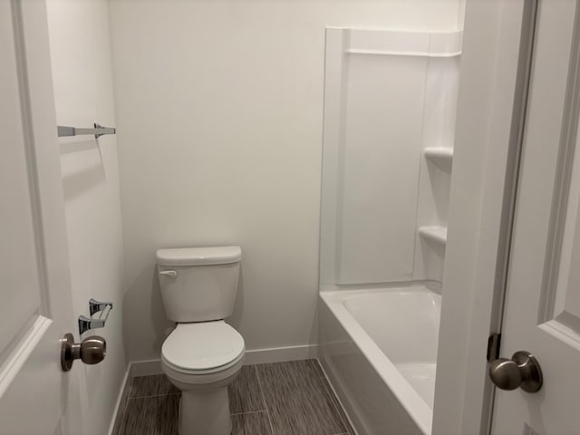 1763 Hauer Trl, Shakopee, MN 55379 - bathroom featuring toilet, baseboards, and tile patterned floors