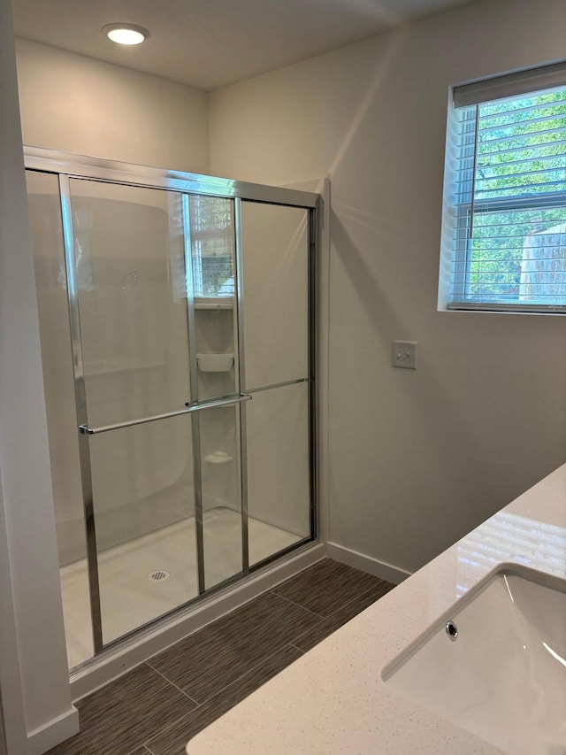 1763 Hauer Trl, Shakopee, MN 55379 - bathroom with a stall shower, baseboards, recessed lighting, and vanity