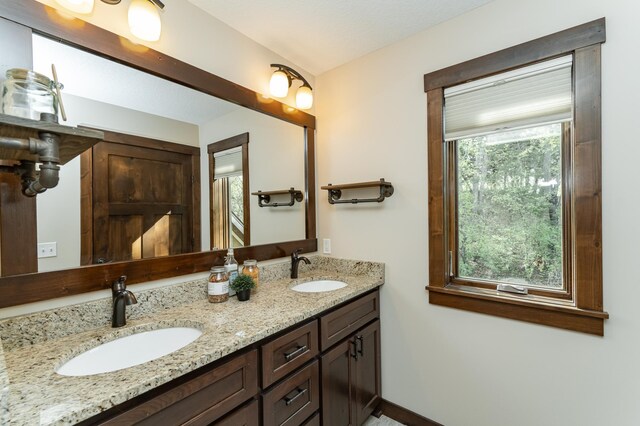 bathroom with double vanity