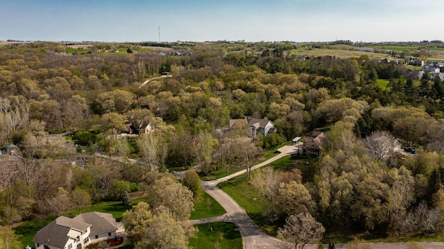 aerial overview of property's location featuring a forest