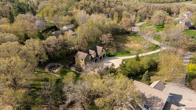 view from above of property featuring a forest