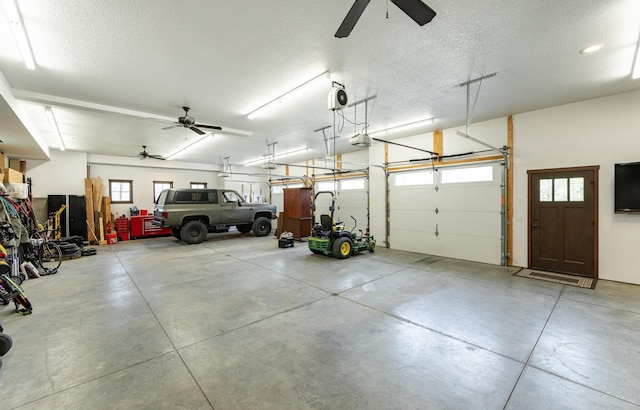 17361 Sugarloaf Pkwy, Minneola Twp, MN 55992 - garage with a ceiling fan and a garage door opener