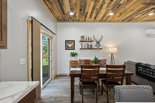 dining space with a wall mounted air conditioner, recessed lighting, wood ceiling, and wood finished floors
