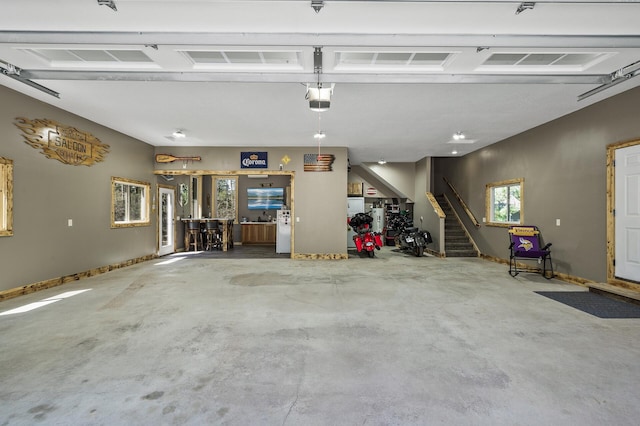 garage featuring a garage door opener