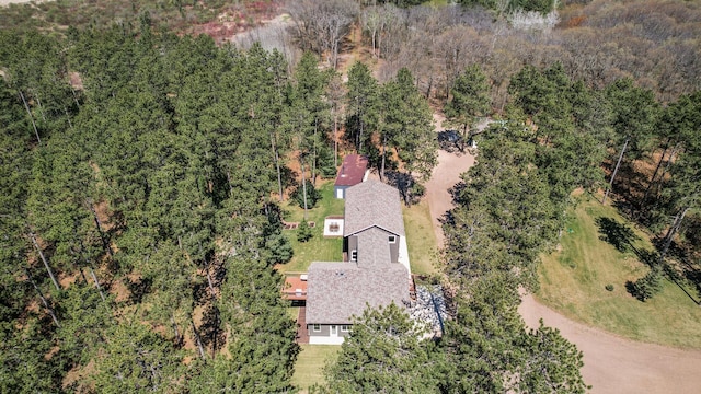 aerial view with a wooded view