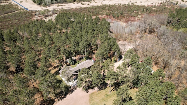 aerial view featuring a view of trees