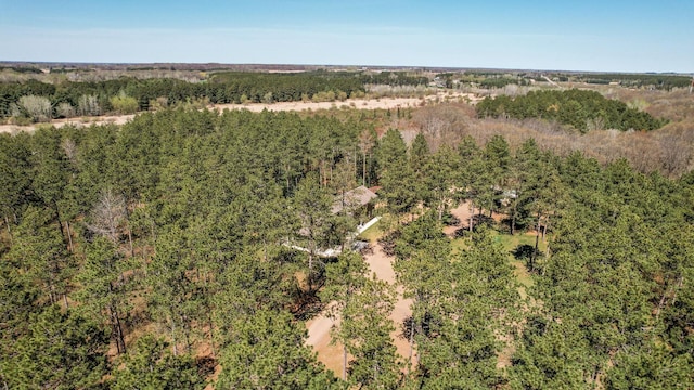aerial view featuring a view of trees