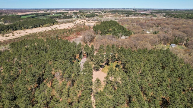 aerial view featuring a view of trees