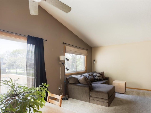 1042 Aston Cir, Burnsville, MN 55337 - living room featuring vaulted ceiling, baseboards, a ceiling fan, and carpet flooring