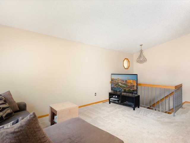 1042 Aston Cir, Burnsville, MN 55337 - carpeted living area featuring baseboards