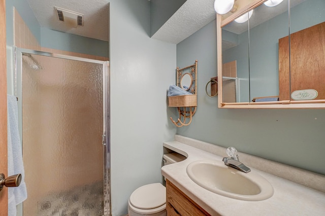 10121 Comstock Rd, Hayward, WI 54843 - full bath with a stall shower, vanity, and toilet