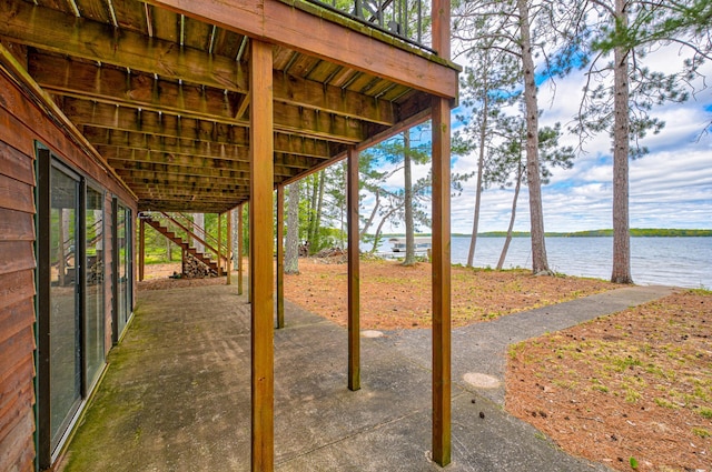 10121 Comstock Rd, Hayward, WI 54843 - view of patio with stairs and a water view