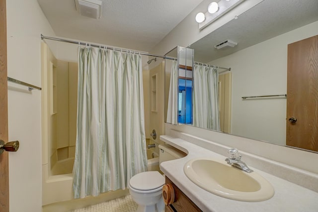 10121 Comstock Rd, Hayward, WI 54843 - bathroom with vanity, shower / bath combo with shower curtain, toilet, a textured ceiling, and tile patterned flooring