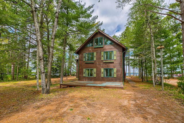 10121 Comstock Rd, Hayward, WI 54843 - back of house with a deck