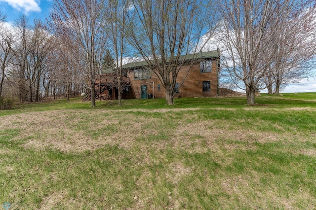 23898 324th Ave, Sverdrup Twp, MN 56586 - view of yard featuring a deck and stairway