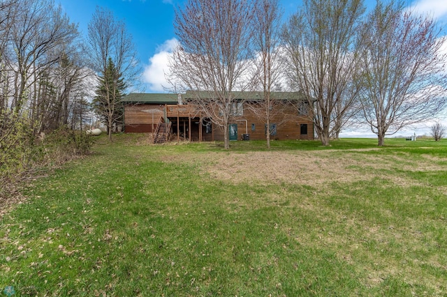 23898 324th Ave, Sverdrup Twp, MN 56586 - view of yard with stairway and a deck