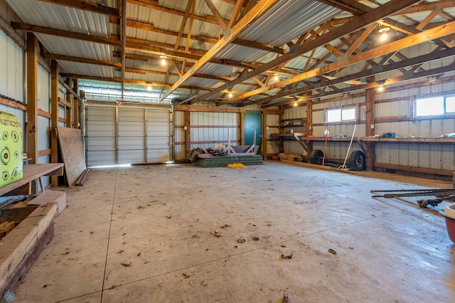 23898 324th Ave, Sverdrup Twp, MN 56586 - garage with a workshop area and metal wall