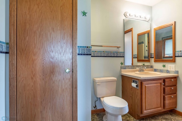 23898 324th Ave, Sverdrup Twp, MN 56586 - bathroom featuring vanity, toilet, and tile patterned flooring