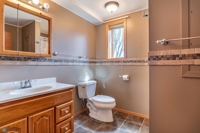23898 324th Ave, Sverdrup Twp, MN 56586 - bathroom with tile patterned floors, crown molding, toilet, and vanity