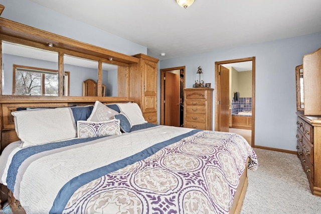 6435 172nd Ave SE, Colfax, ND 58018 - bedroom with baseboards, ensuite bathroom, and light colored carpet