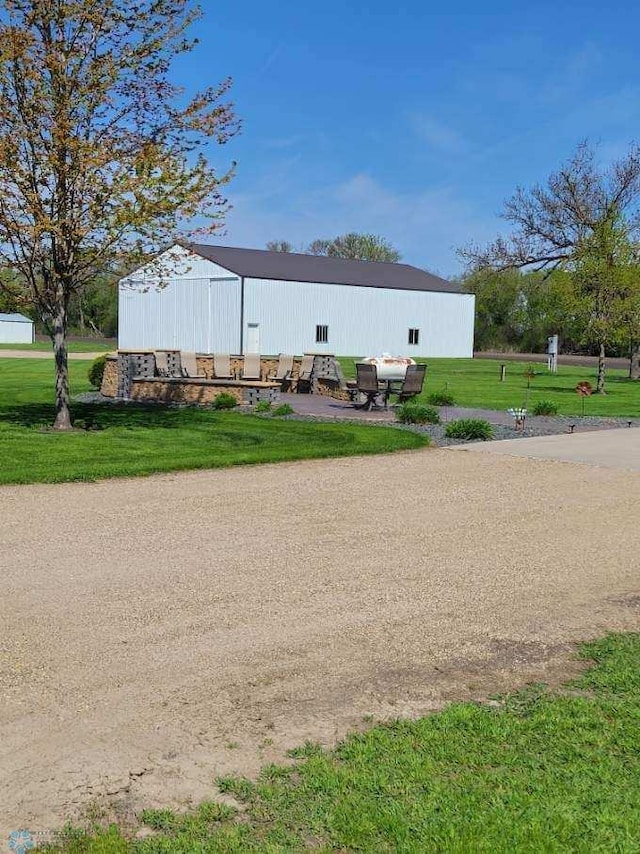 6435 172nd Ave SE, Colfax, ND 58018 - back of property featuring a yard