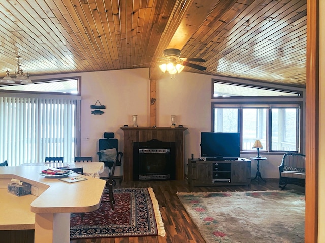 living area featuring wooden ceiling, ceiling fan, and a fireplace