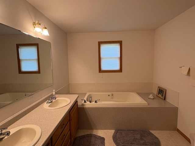 27588 226th St, Underwood, MN 56586 - full bath featuring double vanity, tile patterned flooring, and a garden tub