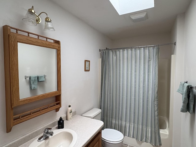 27588 226th St, Underwood, MN 56586 - full bathroom with vanity, toilet, shower / tub combo, and a skylight