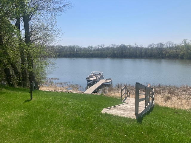 27588 226th St, Underwood, MN 56586 - dock featuring a water view, a forest view, and a lawn
