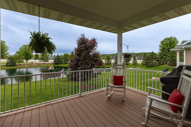 4051 Autumn Lake Ct SW, Rochester, MN 55902 - wooden terrace with a water view and a lawn